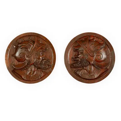 Picture A pair of carved wooden medallions with profiles of knights from the 19th century