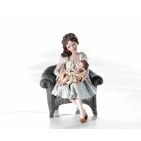 Picture A figurine depicting a mother with a child - Sibania