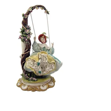 Zdjęcie Porcelanowa figurka - kobieta na huśtawce