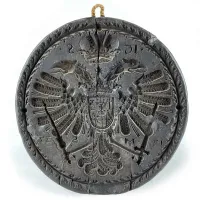 Picture Dark wax butter mold from the 18th century