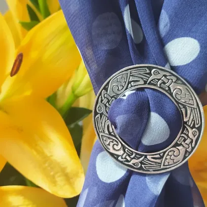 Picture A unique scarf ring made of pewter decorated with a Celtic bird motif