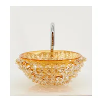 Picture Amber-colored washbasin made of blown Murano glass for the bathroom