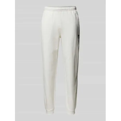 Zdjęcie Spodnie dresowe o kroju tapered fit z nadrukiem z logo model ‘HERITAGE’