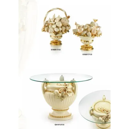 Zdjęcie Pękaty stolik z okrągłym blatem i owocowymi dekoracjami