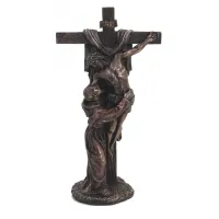 Zdjęcie Dekoracja religijna - statuetka Franciszka z Asyżu obejmującego Jezusa Chrystusa