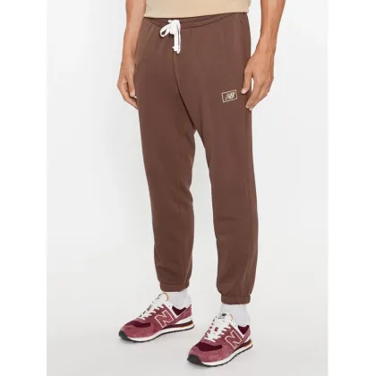 Zdjęcie New Balance Spodnie dresowe NB Essentials Sweatpant MP33509 Brązowy Regular Fit