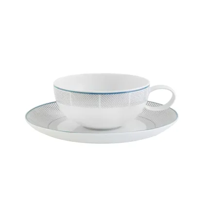 Picture Orquestra porcelain tea cup and saucer with geometric motif and blue finish - Vista Alegre