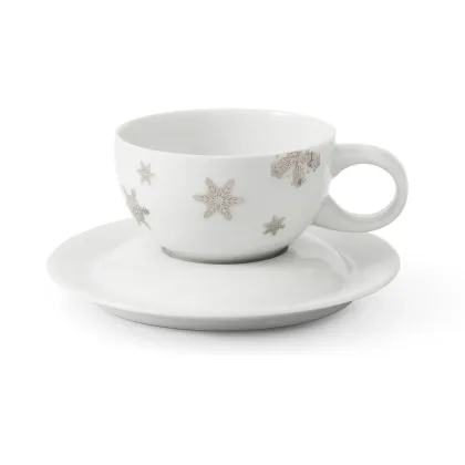 Zdjęcie Piękna porcelanowa filiżanka do herbaty ze spodkiem zdobiona gwiazdkami – Leander