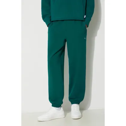 Zdjęcie Puma spodnie dresowe bawełniane MMQ Sweatpants kolor zielony gładkie 624007
