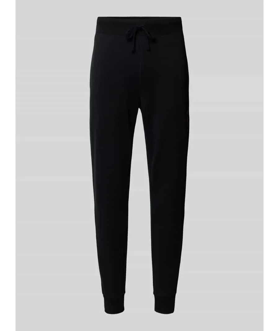 obrazek 1 Spodnie dresowe o kroju slim fit z tunelem