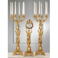 Zdjęcie Piękne świeczniki i zegar dekoracyjny z pozłacanego brązu