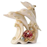 Zdjęcie Fantastyczna dekoracja ceramiczna z delfinami na stół