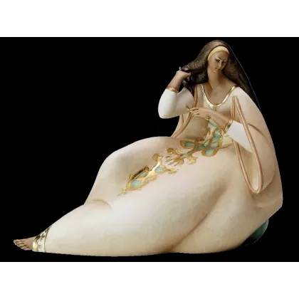 Zdjęcie Elegancka figurka kobiety z grzebieniem