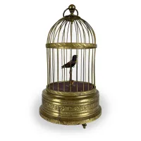 Picture A decorative nightingale in a golden cage from the 20th century