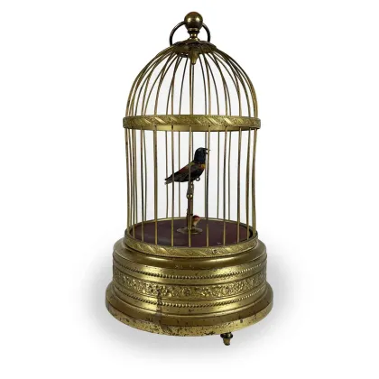 Picture A decorative nightingale in a golden cage from the 20th century