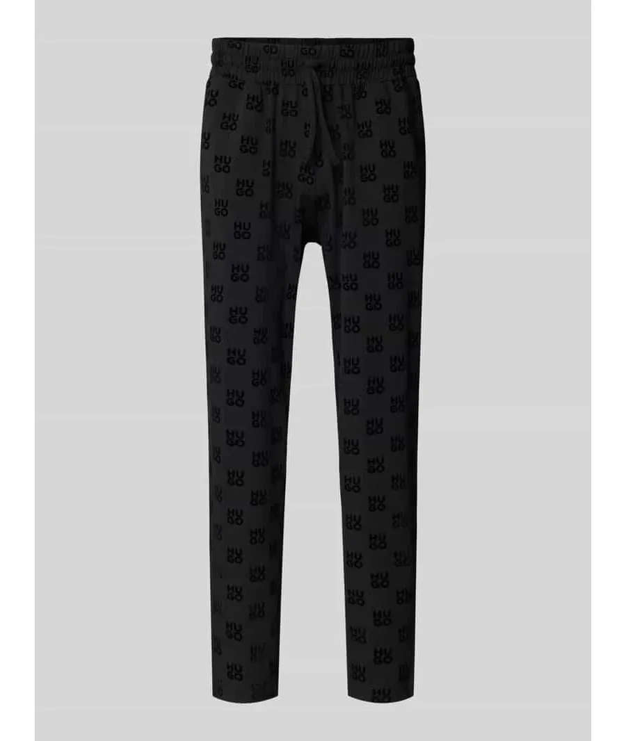 obrazek 1 Spodnie dresowe o kroju regular fit z nadrukiem z logo model ‘Flock’