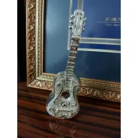 Zdjęcie Figurka z gitarą