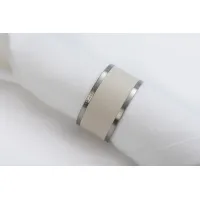 Picture Elegant napkin rings made of the highest quality white leather - for the dining room