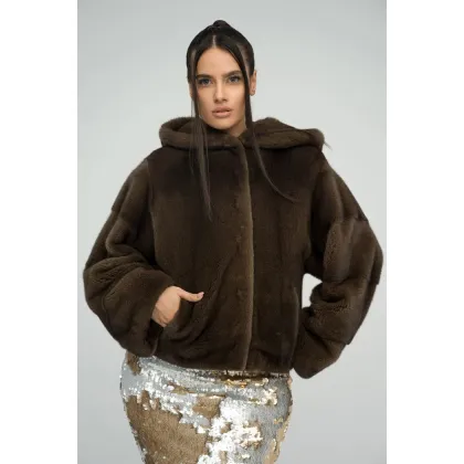 Picture Brown women's mink fur coat, perfect for cold days