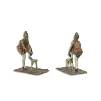 Picture Luxurious bronze sculpture of a woman putting on tights