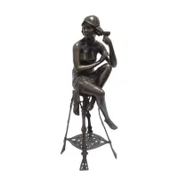 Picture Beautiful stylish sculpture of a sitting female figure
