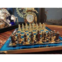 Picture A unique brass chessboard with tin figures - perfect for chess lovers
