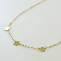 Picture Three plate star necklace in 18K yellow gold