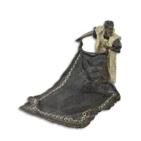 Picture A stylish bronze sculpture of an Arab carpet seller