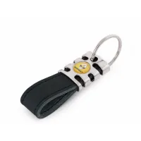 Zdjęcie Elegnacki brelok skórzany z logo firmowym - 8,7 x 2,3 cm