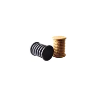 Picture Luxurious stool with smooth curves and distinct textures