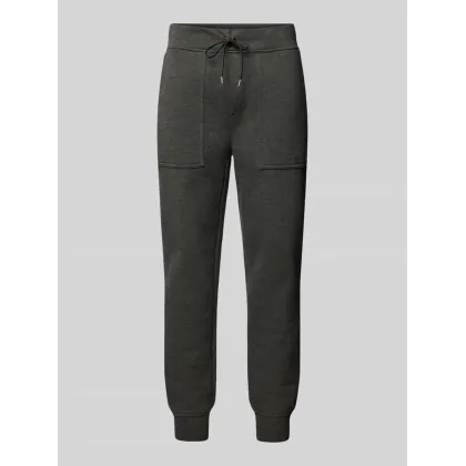 Zdjęcie Spodnie dresowe o kroju slim fit z nakładanymi kieszeniami
