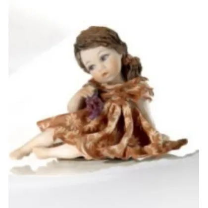 Zdjęcie Dziewczynka z porcelany symbolem jesieni - Autunno 33