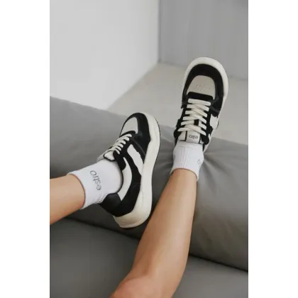 Zdjęcie Estro: Biało-czarne sneakersy damskie ze skóry i weluru
