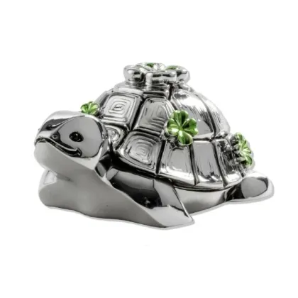 Picture Stylish silver amulet in the shape of a turtle