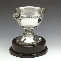 Picture A stylish replica of the Derrynaflan chalice on a wooden pedestal