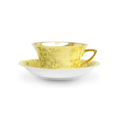 Zdjęcie Filiżanka do herbaty Windsor ze spodkiem z porcelany w kolorze żółtym zdobiona złotymi kwiatami – Leander