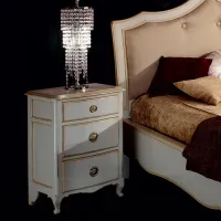 Picture Antique bedside table with three drawers