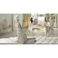 Picture A small desk with sculptures for a tasteful study in antique white and antique gray and smoked calla walnut