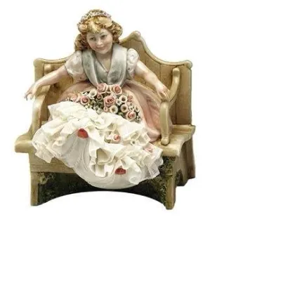 Zdjęcie Siedząca dziewczynka z porcelany