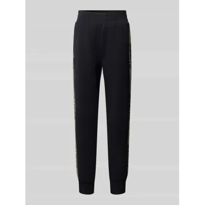 Zdjęcie Spodnie dresowe o kroju slim fit z nadrukami z logo