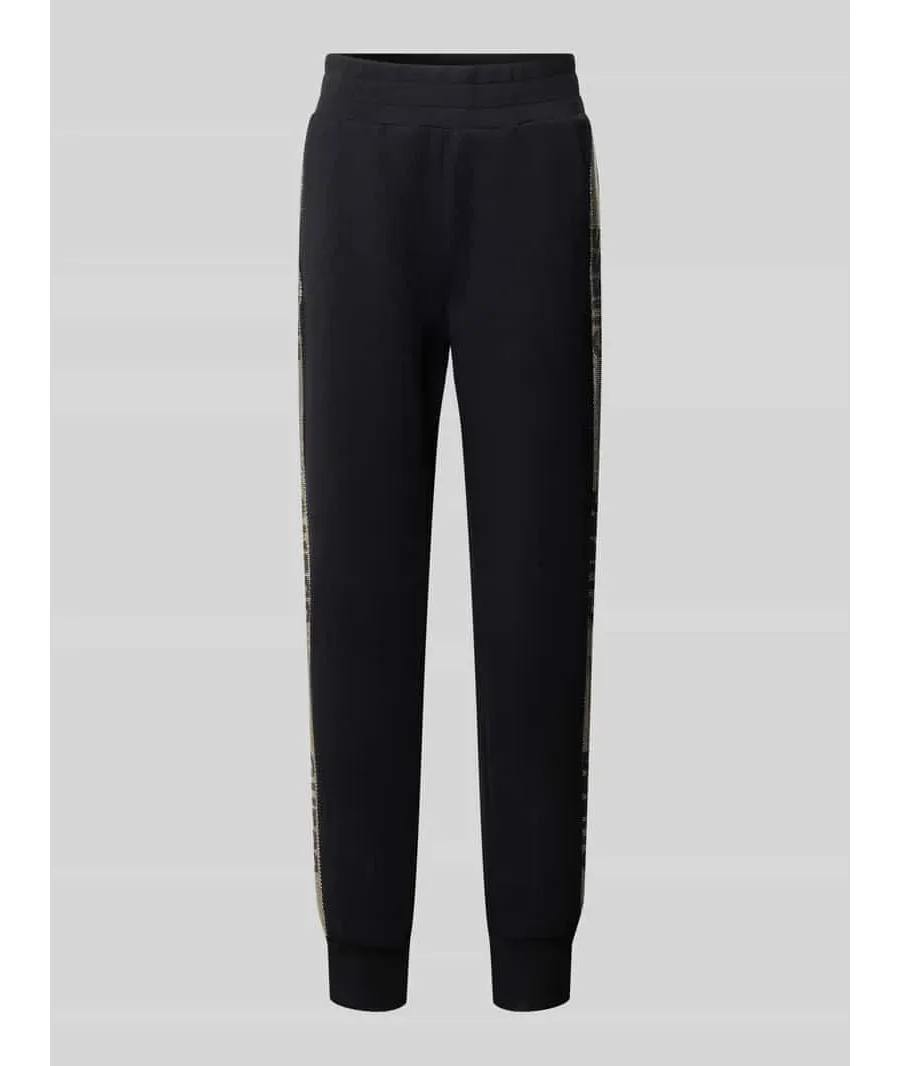 obrazek 1 Spodnie dresowe o kroju slim fit z nadrukami z logo