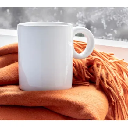 Picture Ceramic mug with a round handle