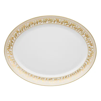 Zdjęcie Mały owalny talerz wykonany z porcelany z roślinnymi złotymi elementami dekoracyjnymi z kolekcji Anna - Vista Alegre