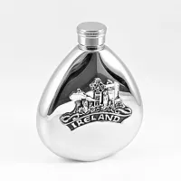 Picture Luxurious whiskey flask decorated with an Irish tin emblem