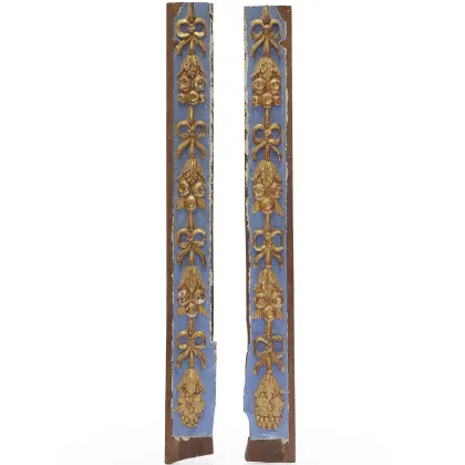 Picture A pair of carved wood friezes lacquered in blue and gold from the 18th century