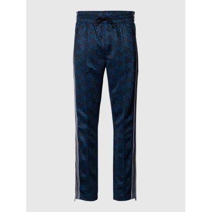 Zdjęcie Spodnie dresowe z logo na całej powierzchni model ‘Datalas’