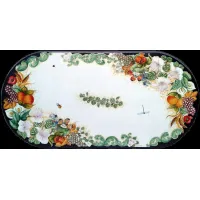Picture Oval garden countertop made of lava, decorated with a flower and fruit motif - Ceramiche Valchida