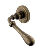 Picture Elegant Mary door handle covered with antique bronze