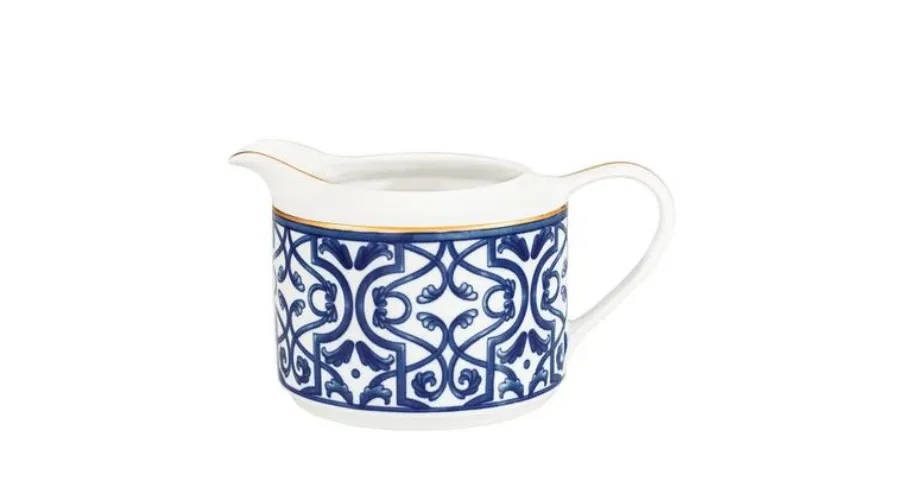 obrazek 1 Oryginalna porcelanowa sosjerka ze zdobieniami