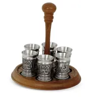 Picture An unusual set of 6 vodka glasses on a wooden stand